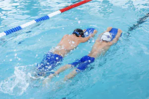 kids swimming in lap pool